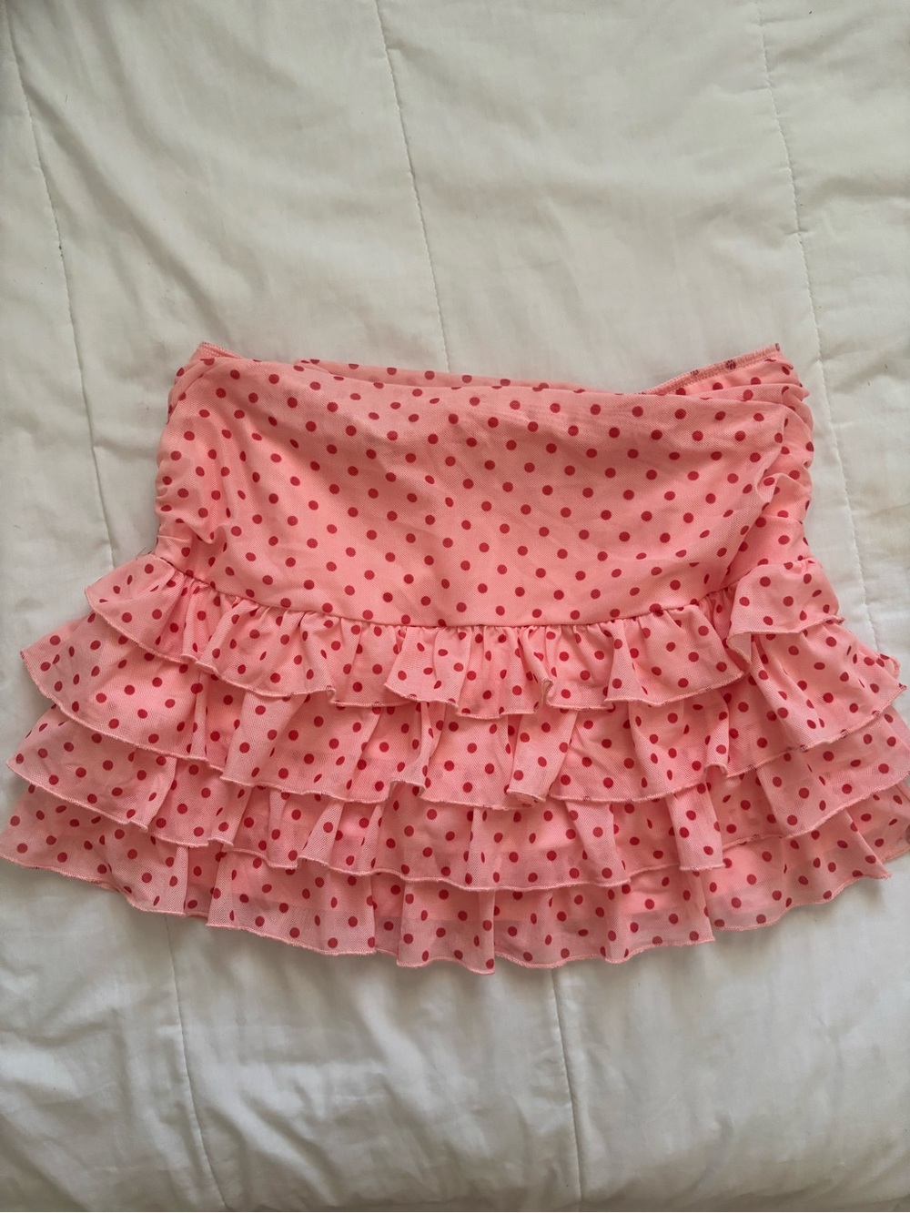 Pleated pink polka dot skirt